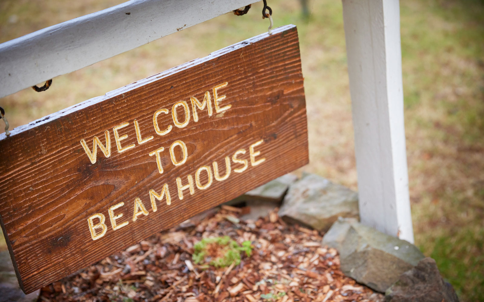 A sign which reads 'WELCOME TO BEAM HOUSE'