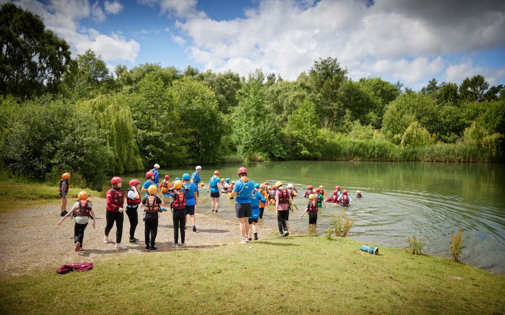 PGL activity instructors leading a water session in the lake at Boreatton Park